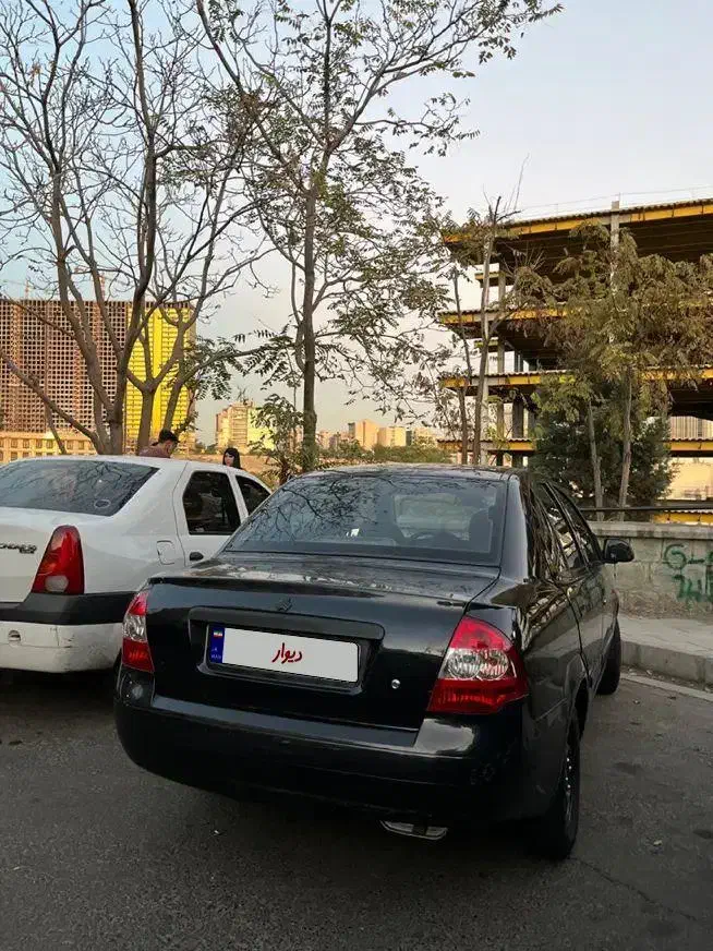 تیبا صندوق دار SX - 1391