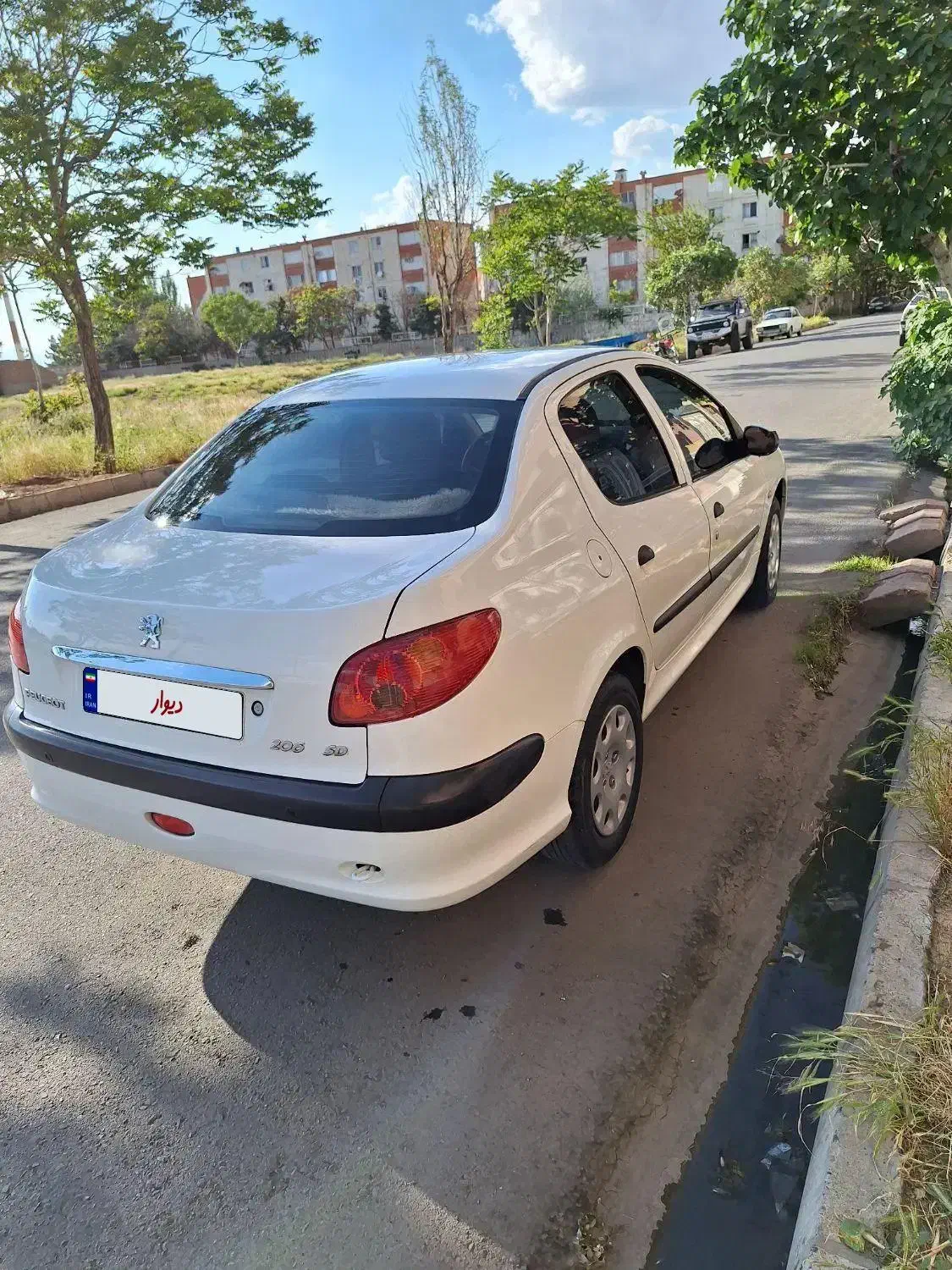 پژو ۲۰۶ صندوق دار v8 - 1395
