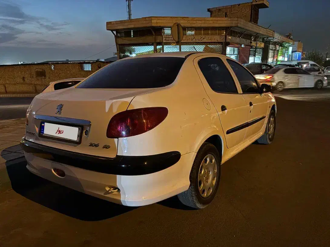 پژو ۲۰۶ صندوق دار v8 - 1391