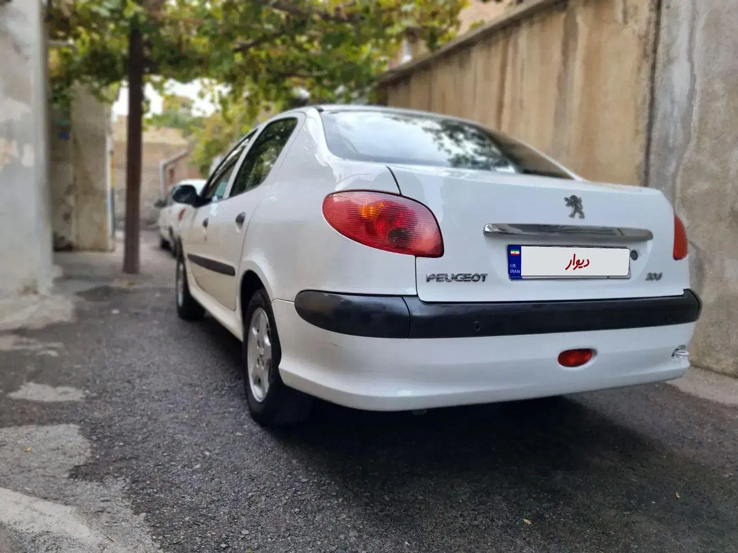 پژو ۲۰۶ صندوق دار v8 - 1394
