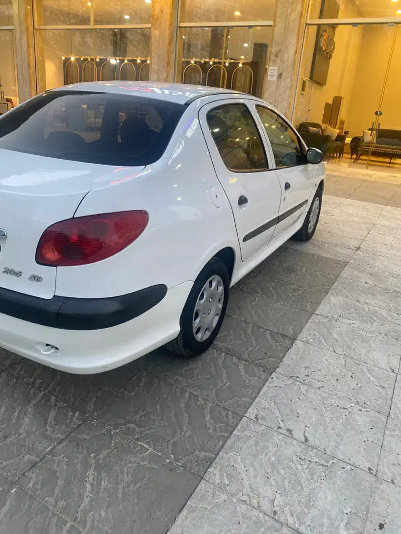 پژو ۲۰۶ صندوق دار v8 - 1396