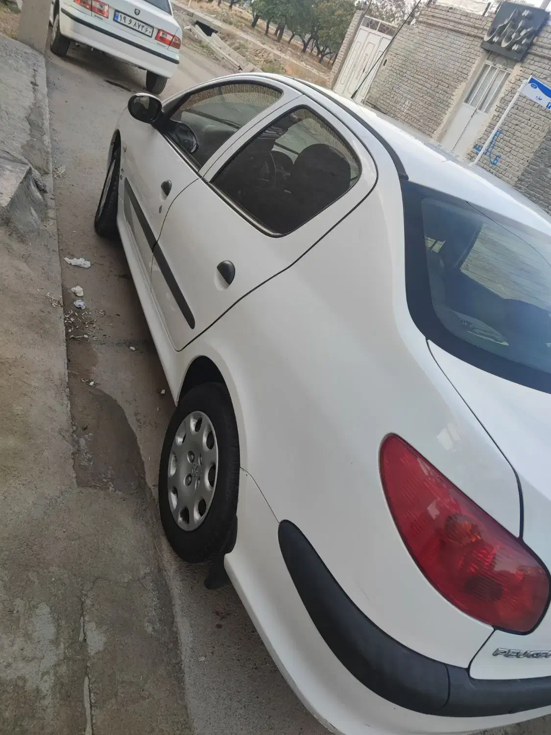 پژو ۲۰۶ صندوق دار v8 - 1396