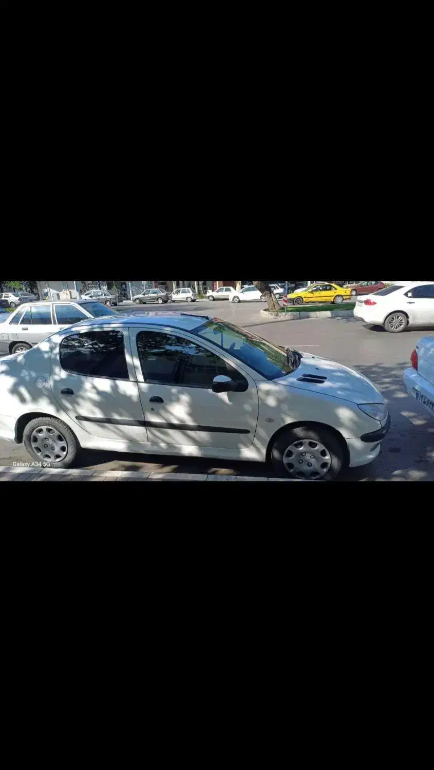 پژو ۲۰۶ صندوق دار v8 - 1391