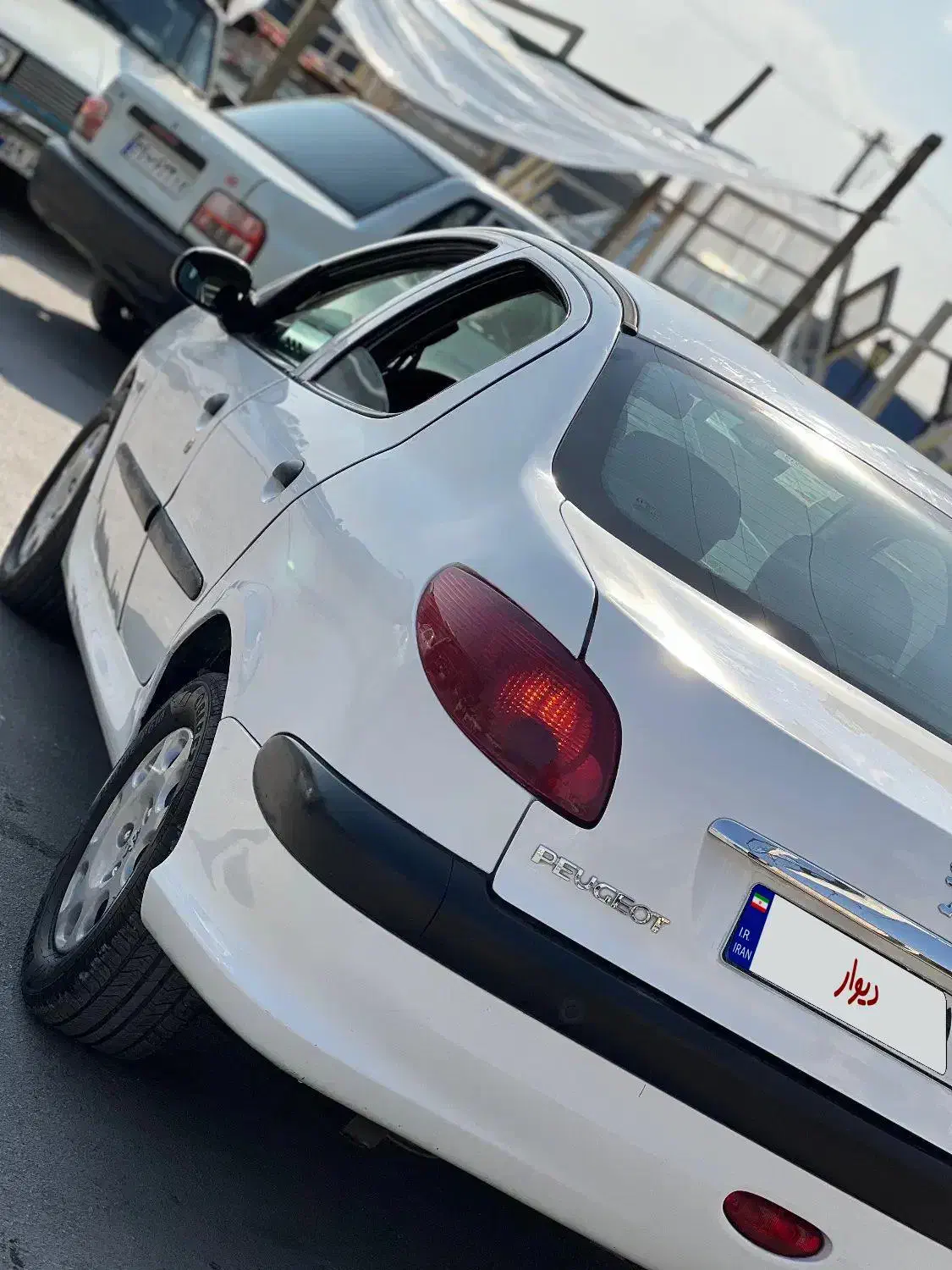 پژو ۲۰۶ صندوق دار v8 - 1396