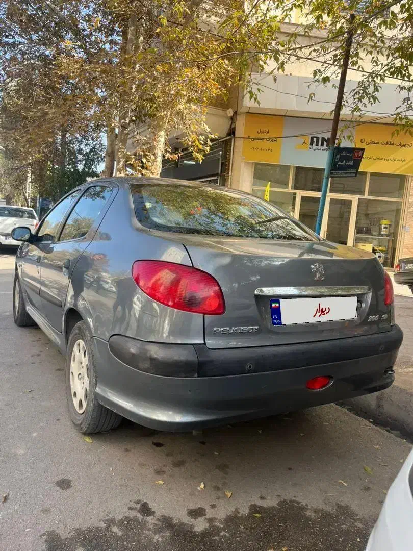پژو ۲۰۶ صندوق دار v8 - 1396