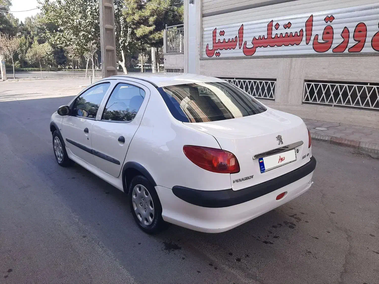 پژو ۲۰۶ صندوق دار v8 - 1392