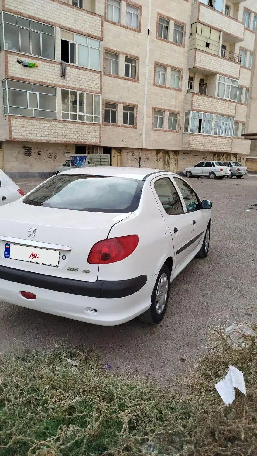 پژو ۲۰۶ صندوق دار v8 - 1394
