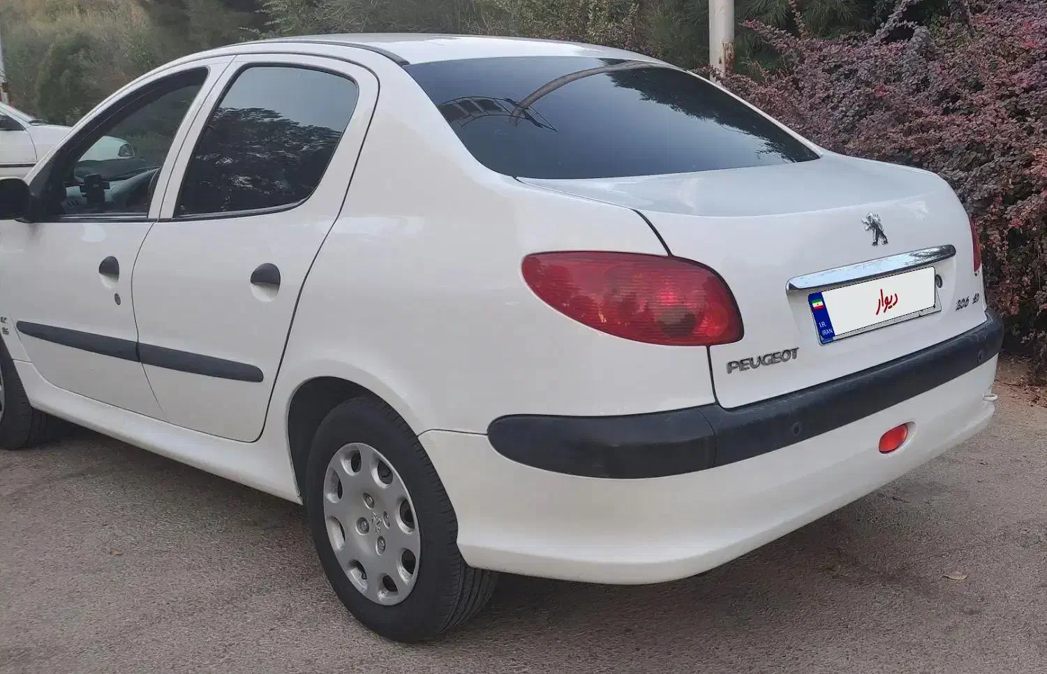 پژو ۲۰۶ صندوق دار v8 - 1396