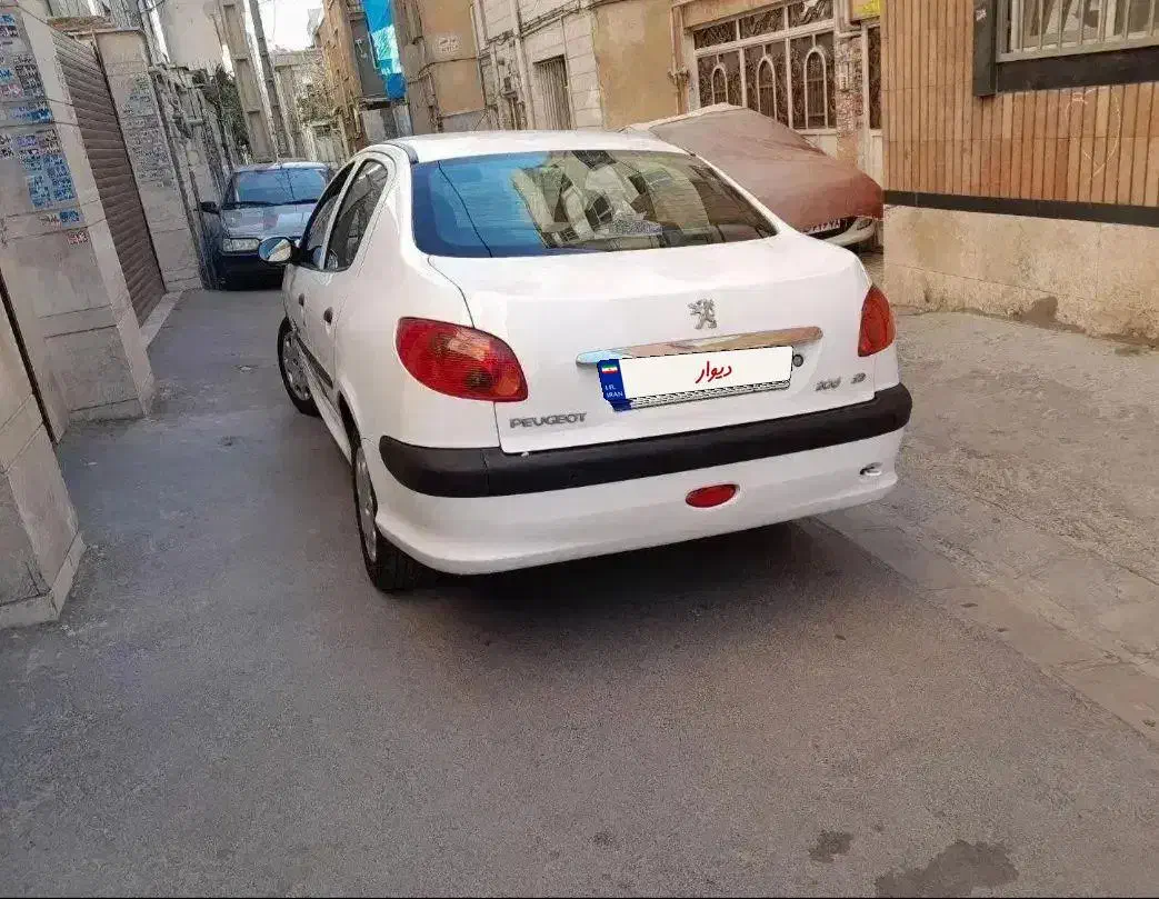پژو ۲۰۶ صندوق دار v8 - 1396
