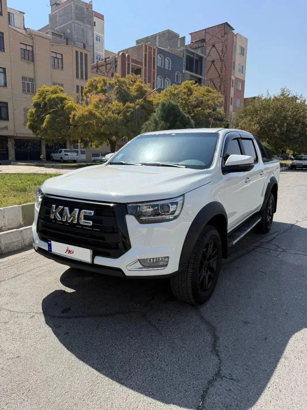 خودرو کی ام سی، T8 آگهی ann_20875817