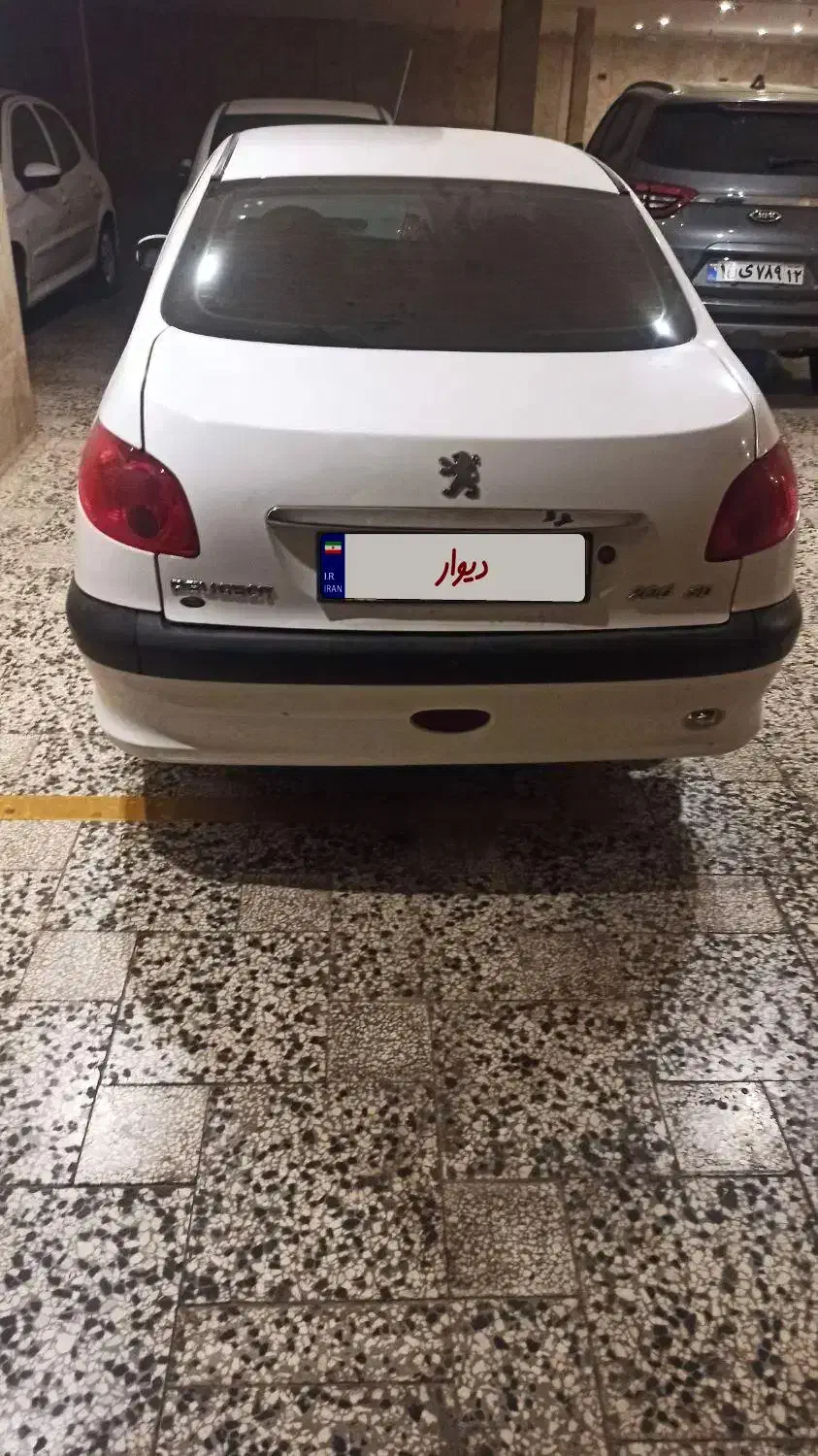 پژو ۲۰۶ صندوق دار v8 - 1391