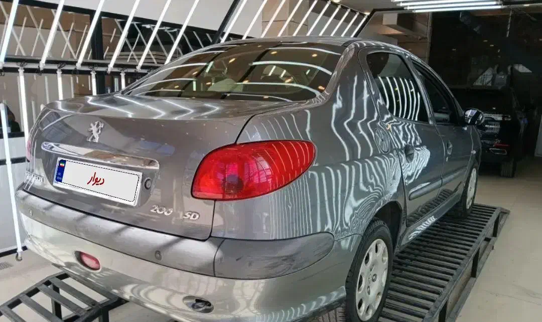 پژو ۲۰۶ صندوق دار v8 - 1394