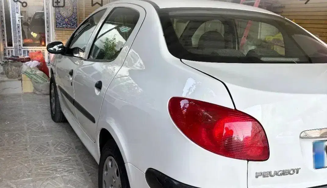 پژو ۲۰۶ صندوق دار v8 - 1396