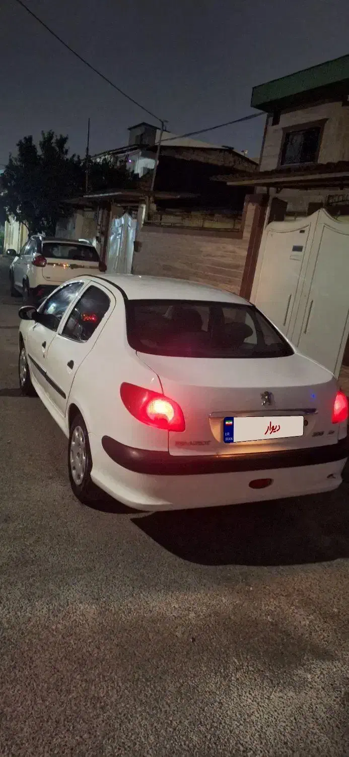 پژو ۲۰۶ صندوق دار v8 - 1396