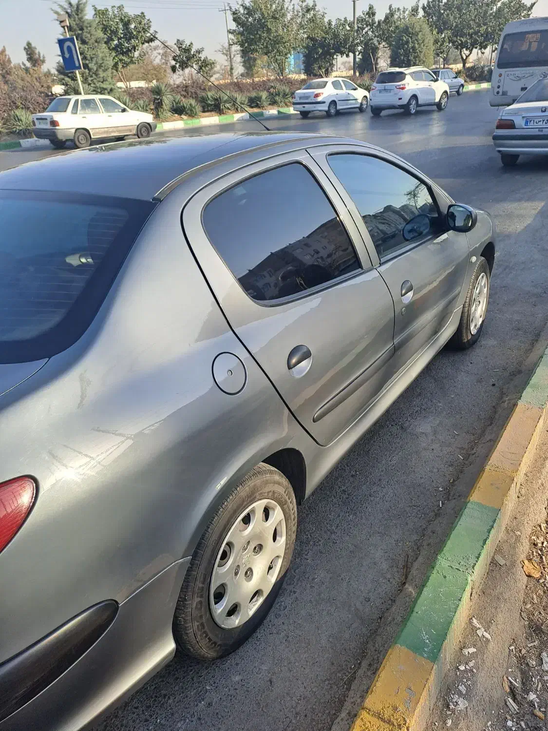 پژو ۲۰۶ صندوق دار v8 - 1396