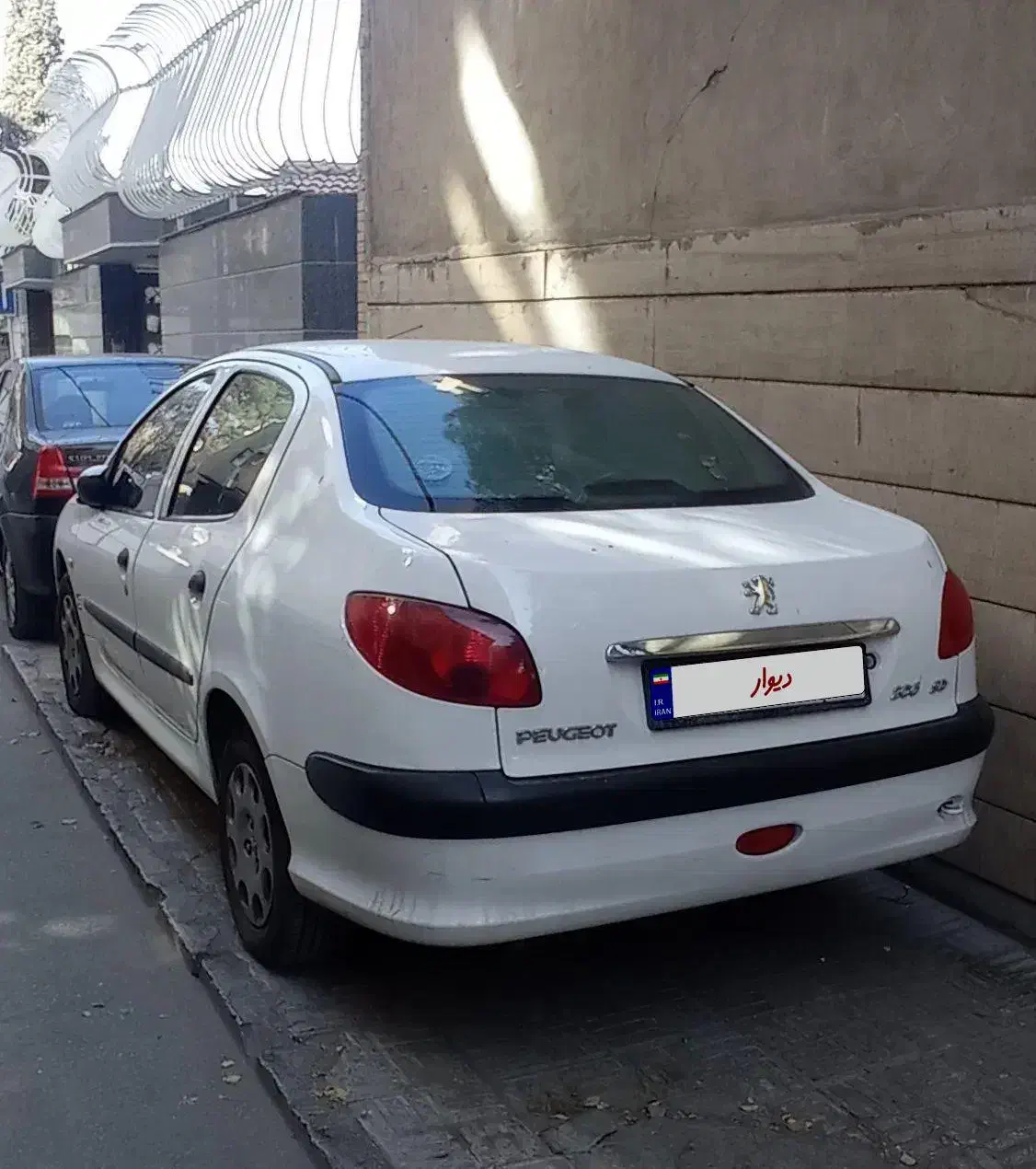 پژو ۲۰۶ صندوق دار v8 - 1397
