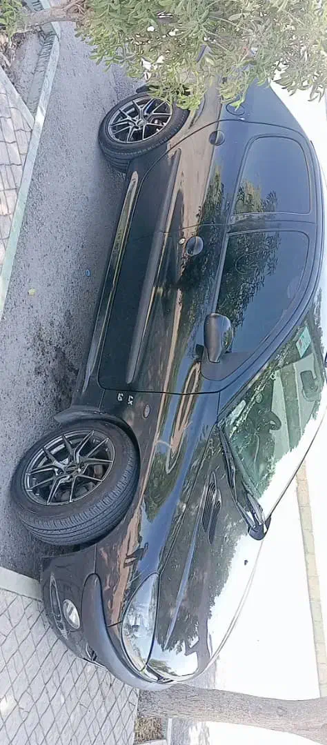 پژو ۲۰۶ صندوق دار v8 - 1395