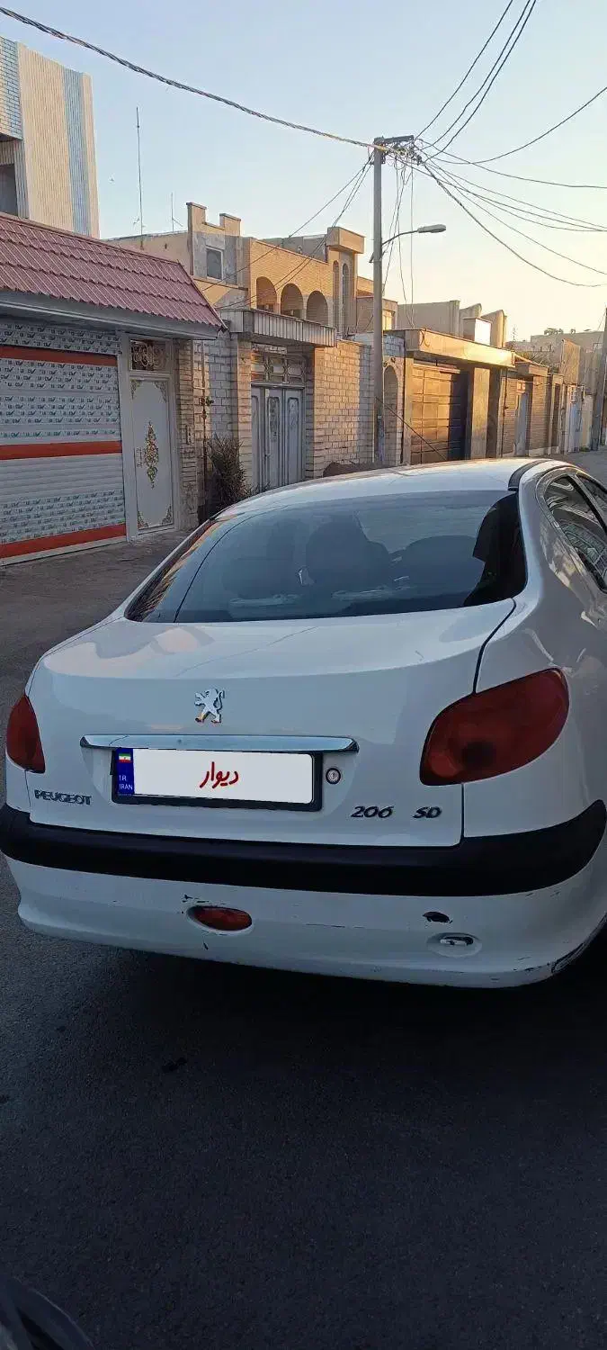 پژو ۲۰۶ صندوق دار v8 - 1396