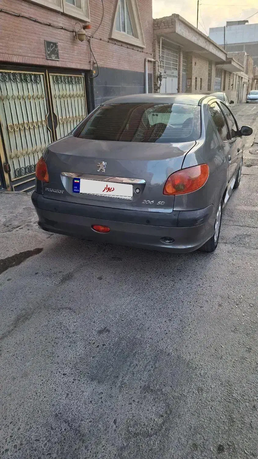 پژو ۲۰۶ صندوق دار v8 - 1393