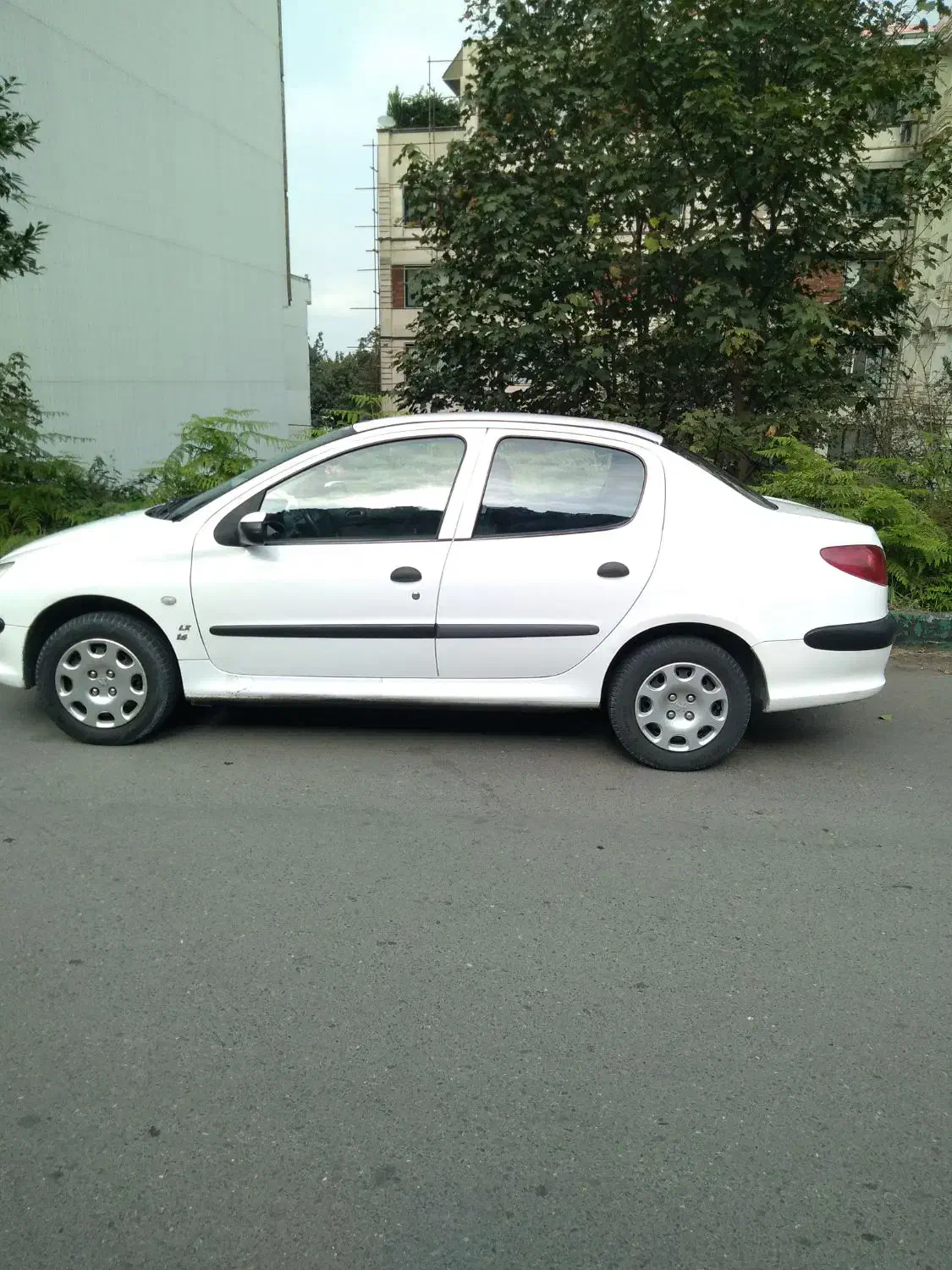 پژو ۲۰۶ صندوق دار v8 - 1398