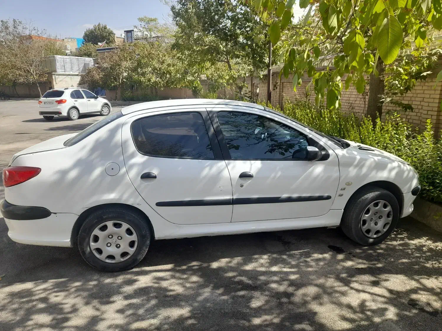 پژو ۲۰۶ صندوق دار v8 - 1391