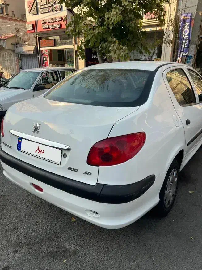 پژو ۲۰۶ صندوق دار v8 - 1394