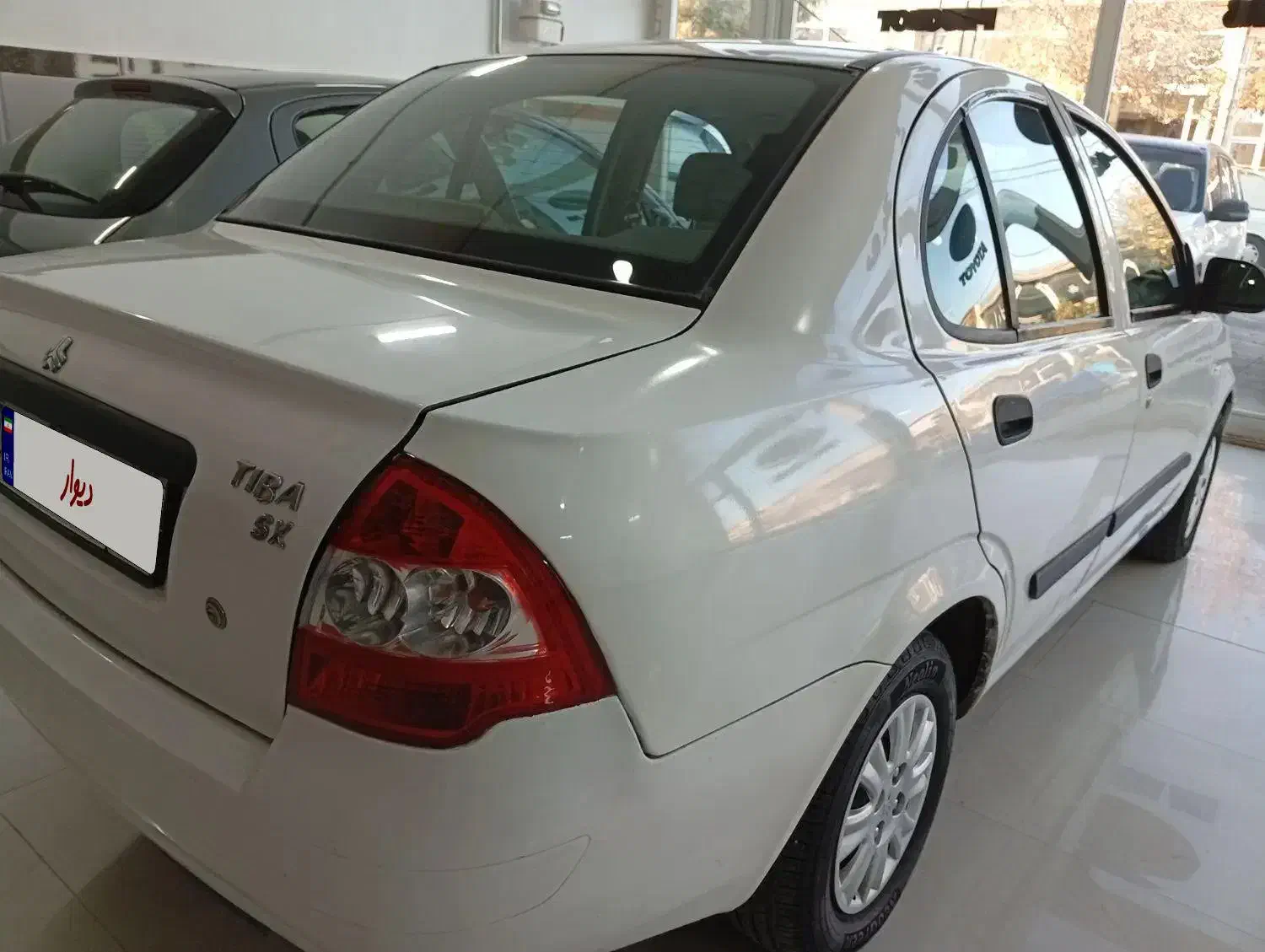 تیبا صندوق دار SX - 1393