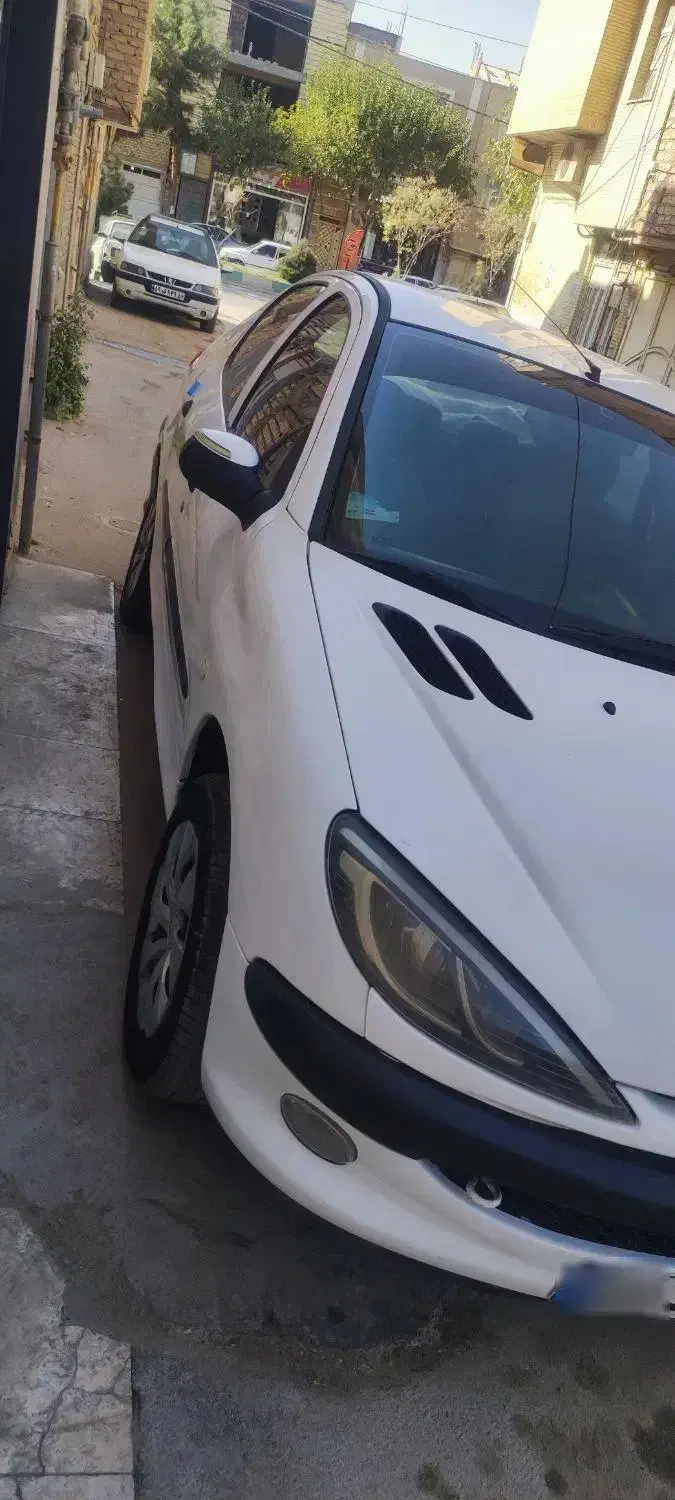 پژو ۲۰۶ صندوق دار v8 - 1391