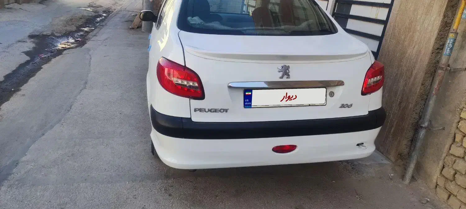 پژو ۲۰۶ صندوق دار v8 - 1391