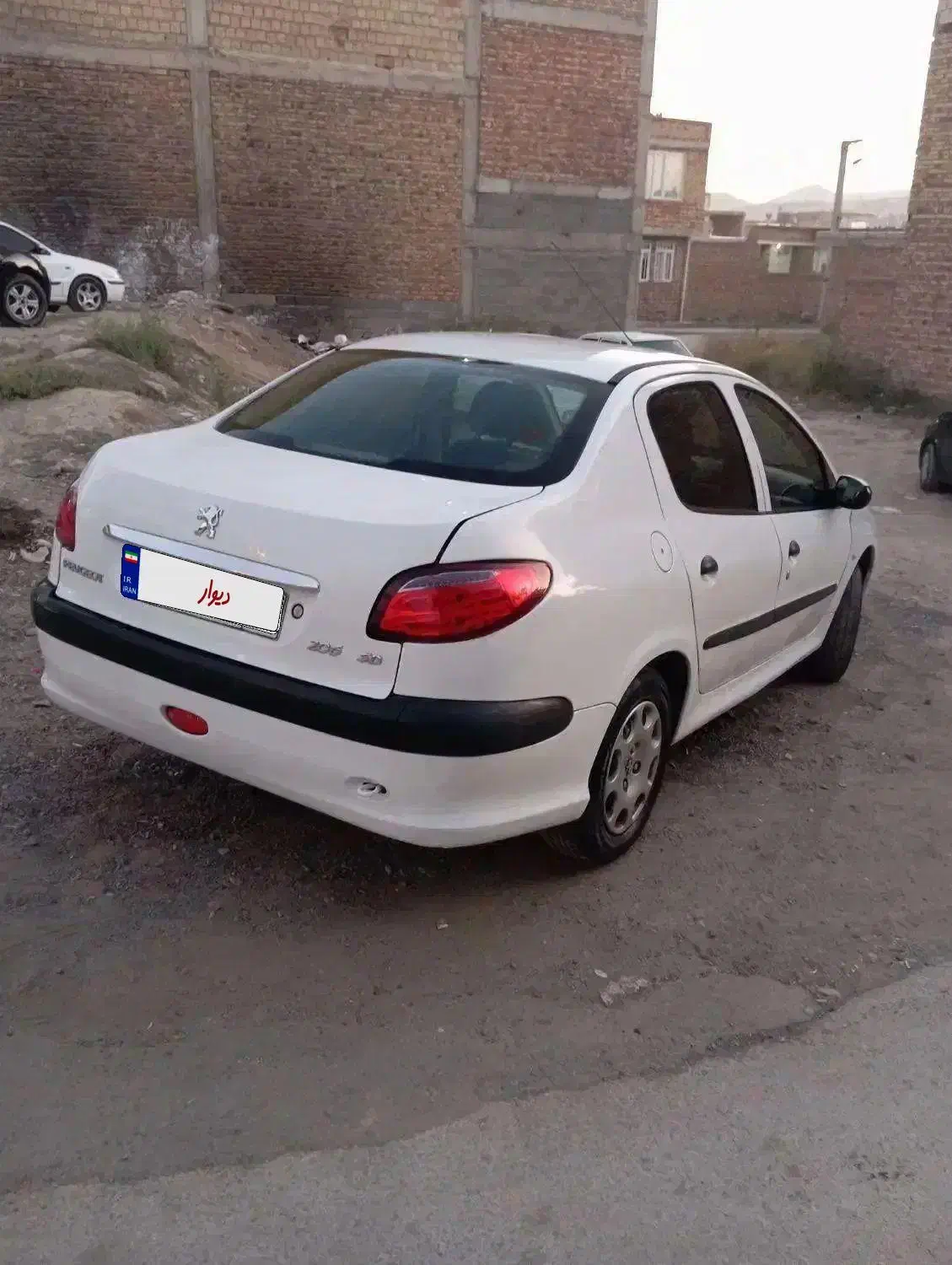 پژو ۲۰۶ صندوق دار v8 - 1394