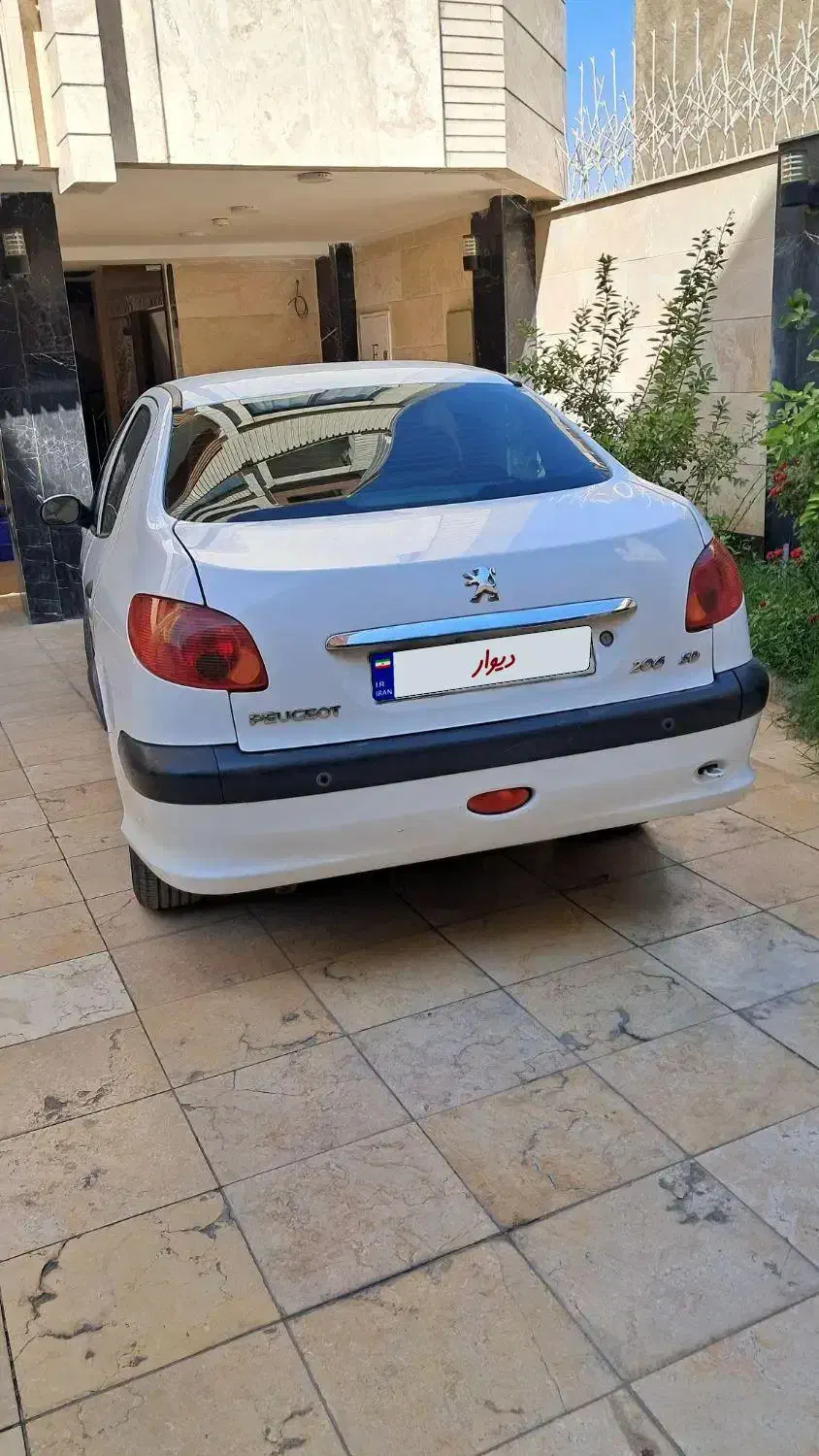 پژو ۲۰۶ صندوق دار v8 - 1396