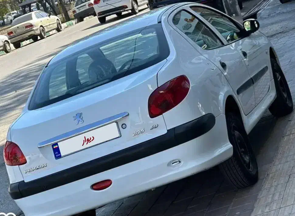 پژو ۲۰۶ صندوق دار v8 - 1396