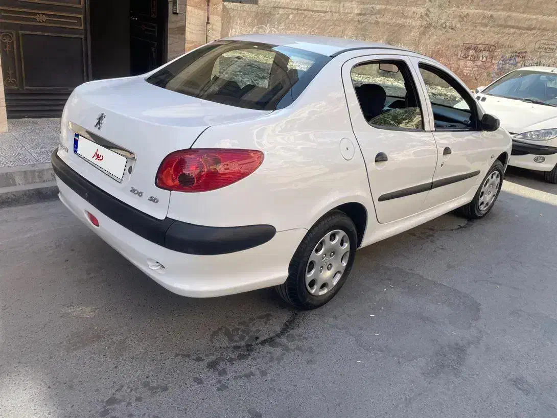 پژو ۲۰۶ صندوق دار v8 - 1395