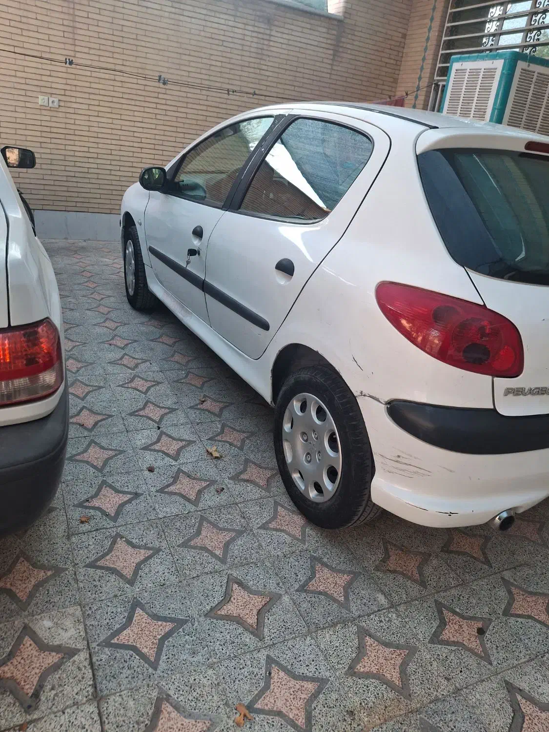 پژو 206 تیپ 3 - 1390