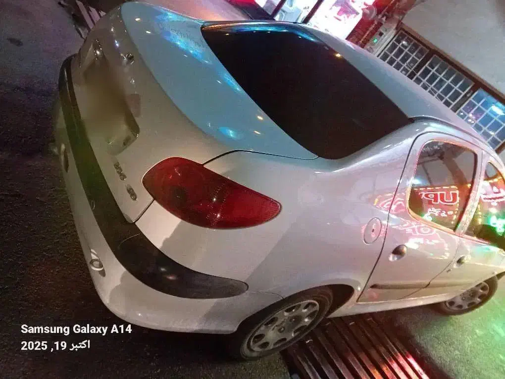 پژو ۲۰۶ صندوق دار v8 - 1396