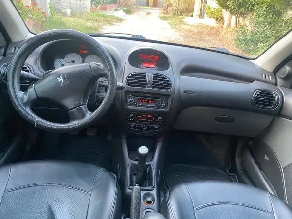 پژو ۲۰۶ صندوق دار v8 - 1396