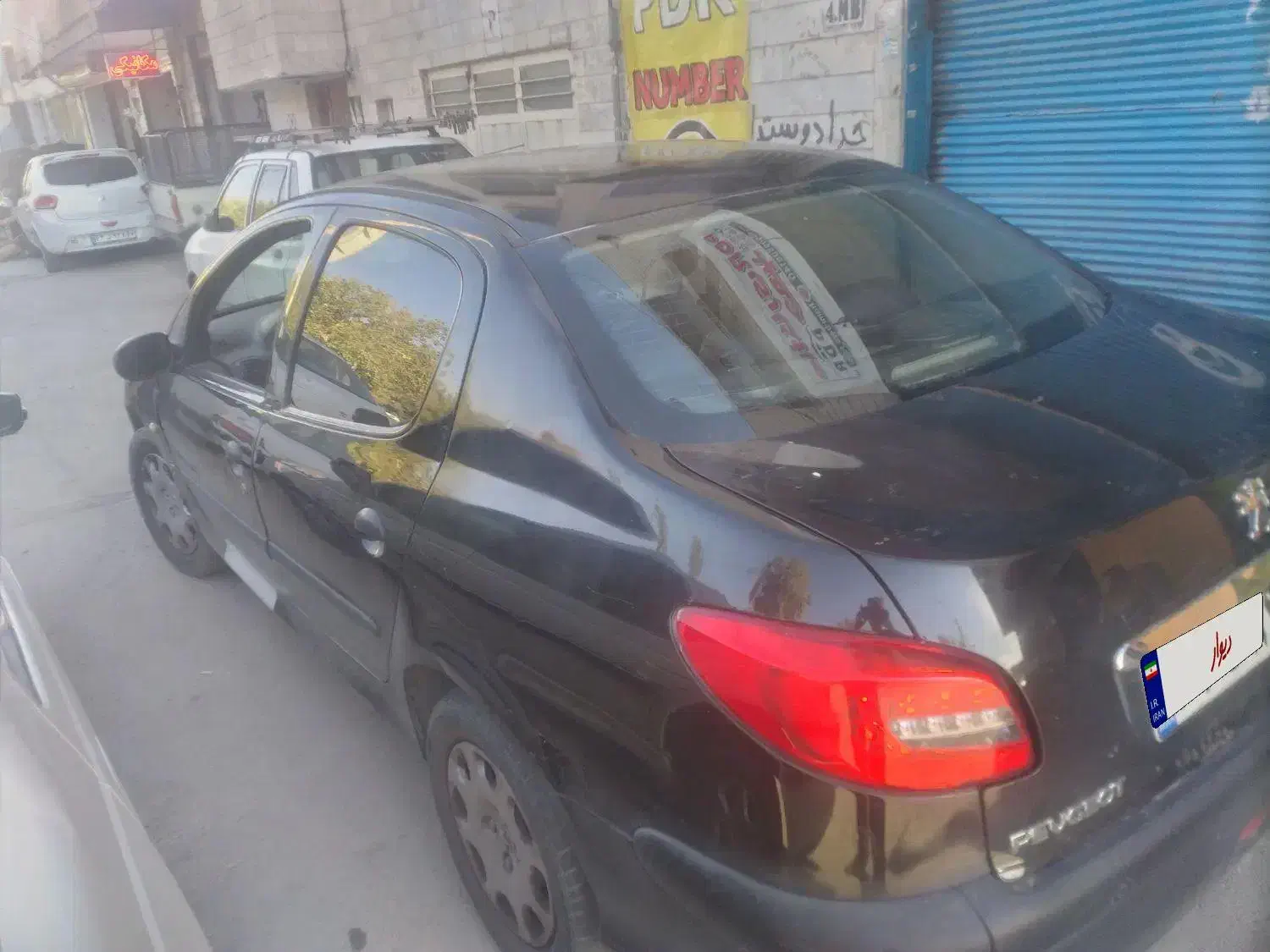 پژو ۲۰۶ صندوق دار v8 - 1394