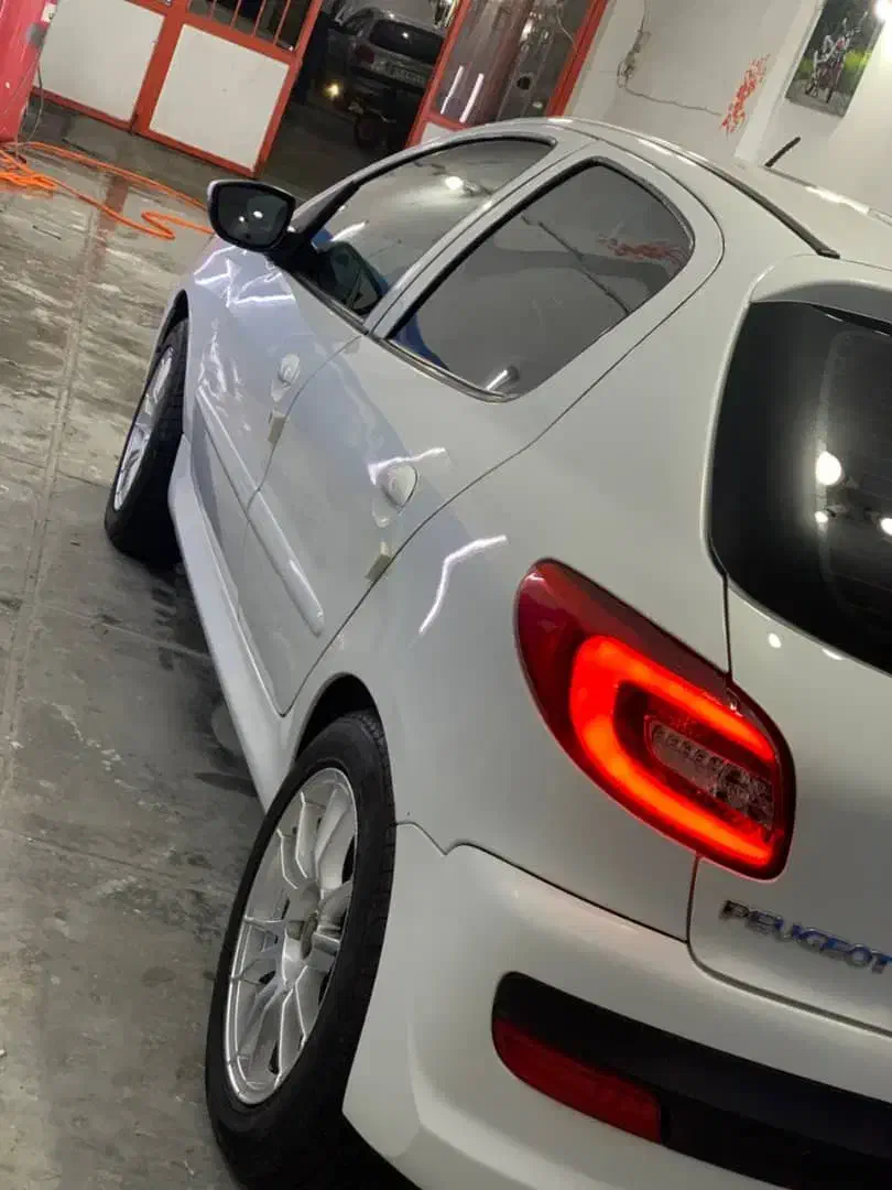 پژو 207 دنده ای فرمان برقی - 1401