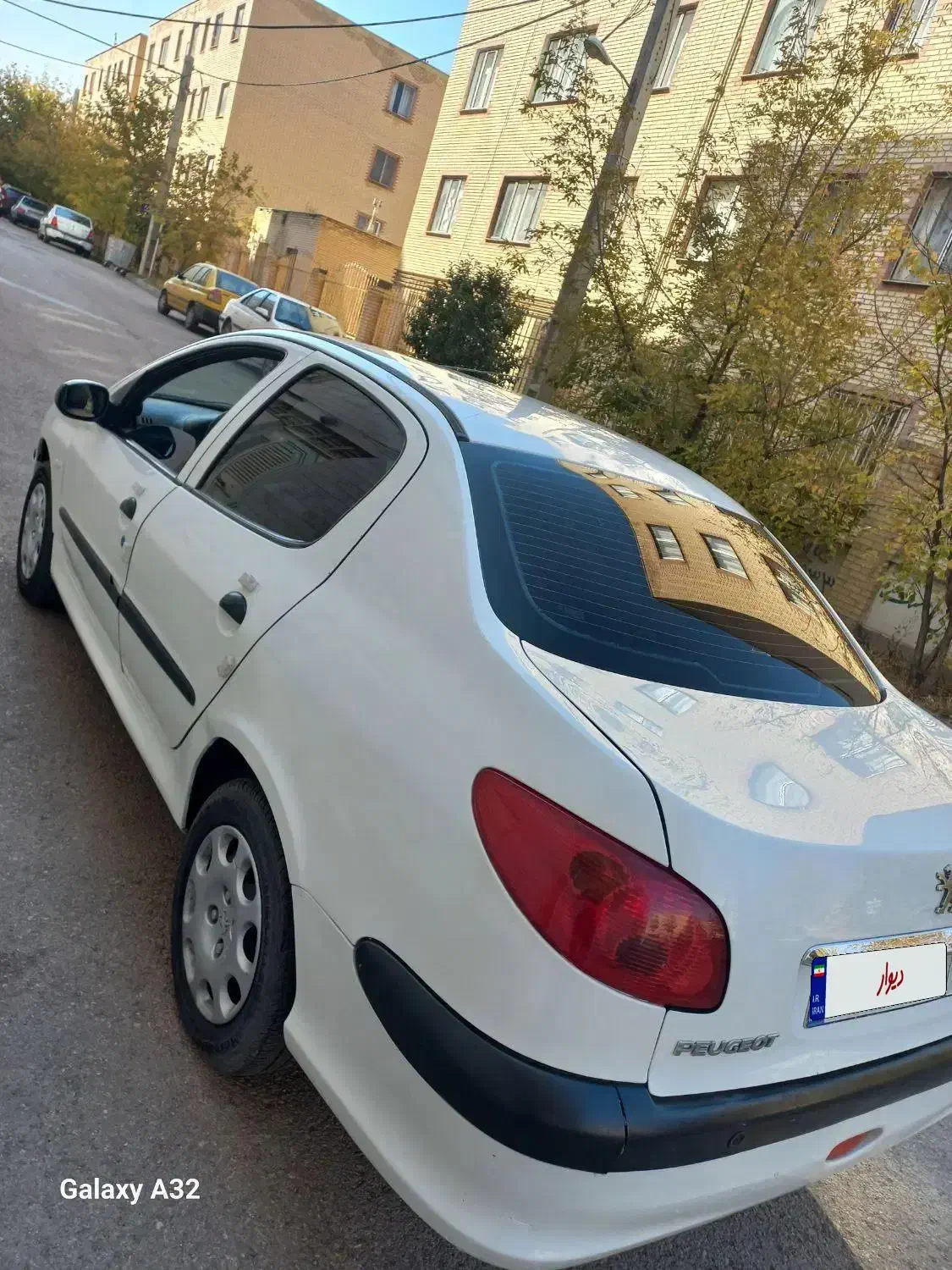 پژو ۲۰۶ صندوق دار v8 - 1394