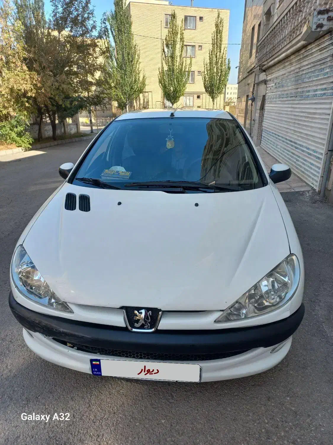 پژو ۲۰۶ صندوق دار v8 - 1394