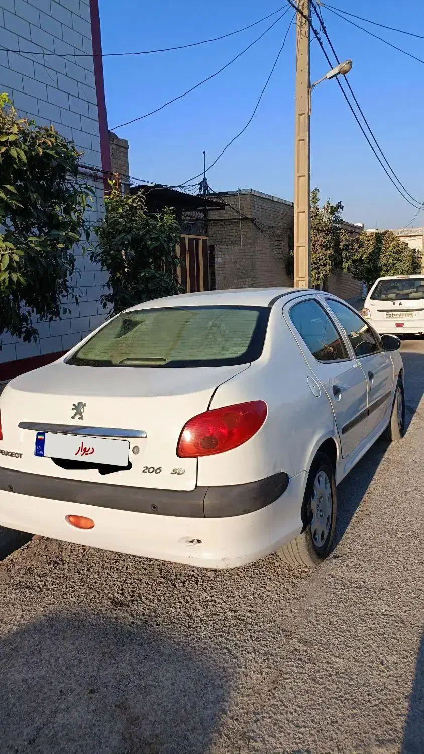 پژو ۲۰۶ صندوق دار v8 - 1396