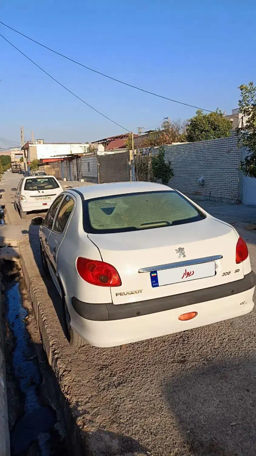 پژو ۲۰۶ صندوق دار v8 - 1396