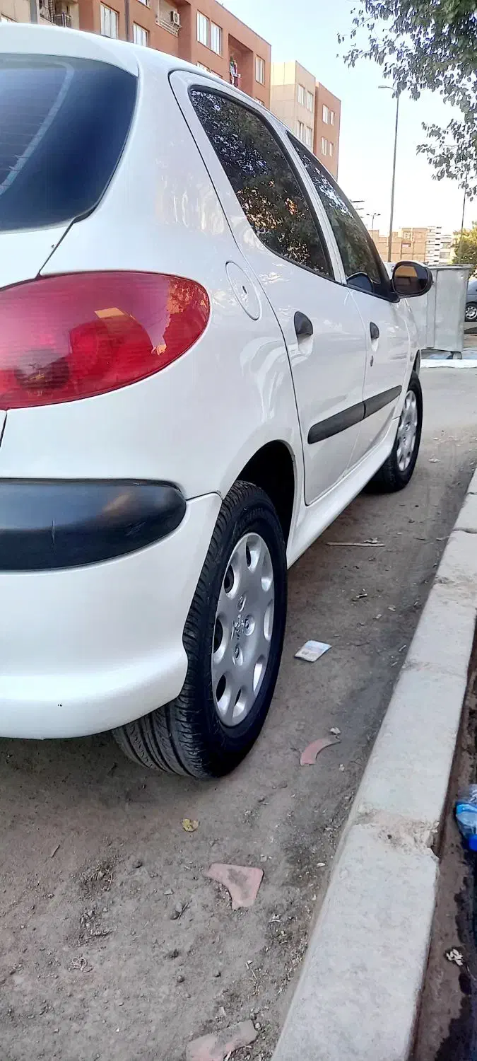 پژو ۲۰۶ صندوق دار v8 - 1396