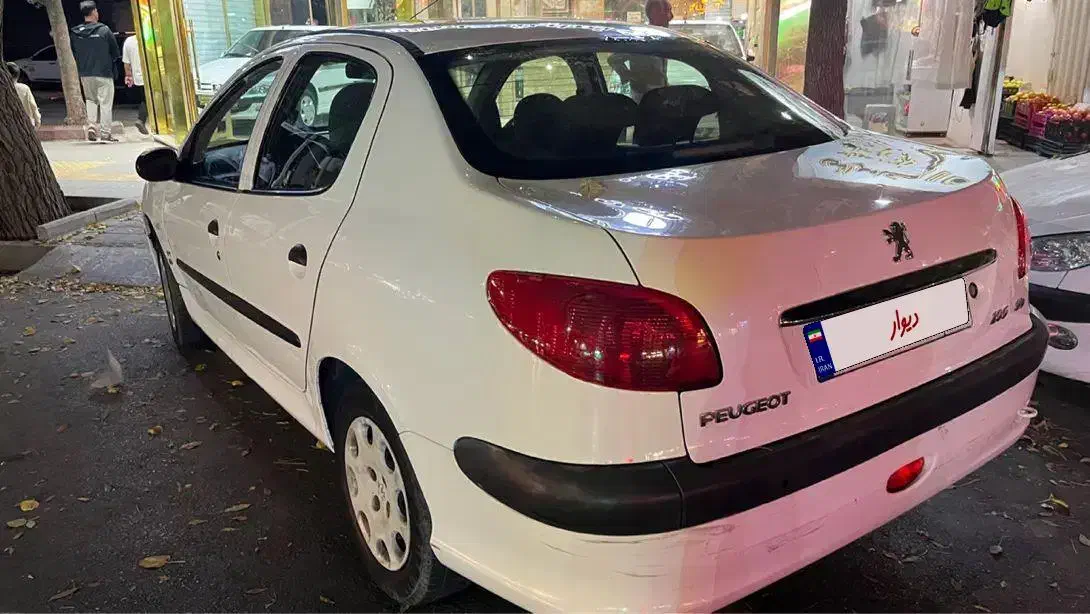 پژو ۲۰۶ صندوق دار v8 - 1395