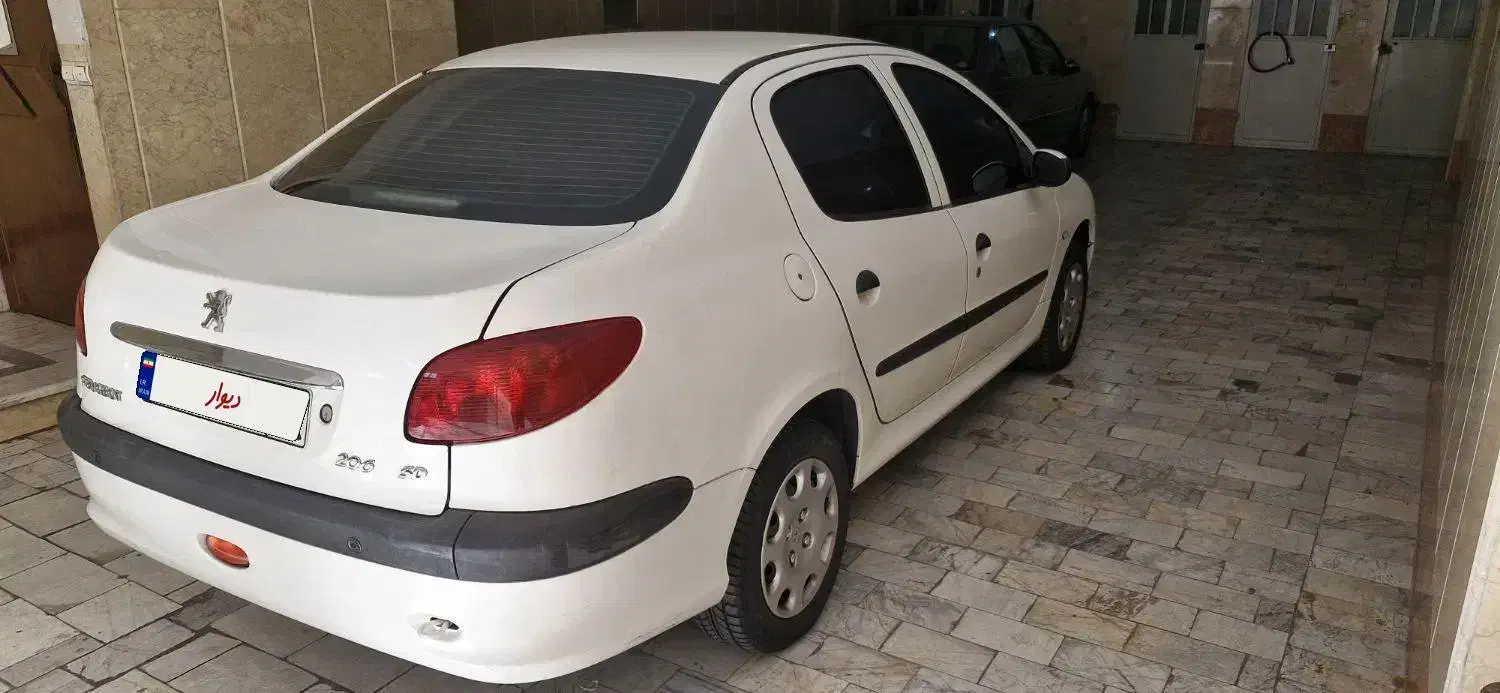 پژو ۲۰۶ صندوق دار v8 - 1395