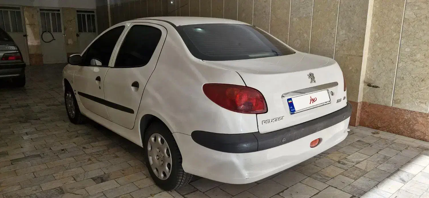 پژو ۲۰۶ صندوق دار v8 - 1395