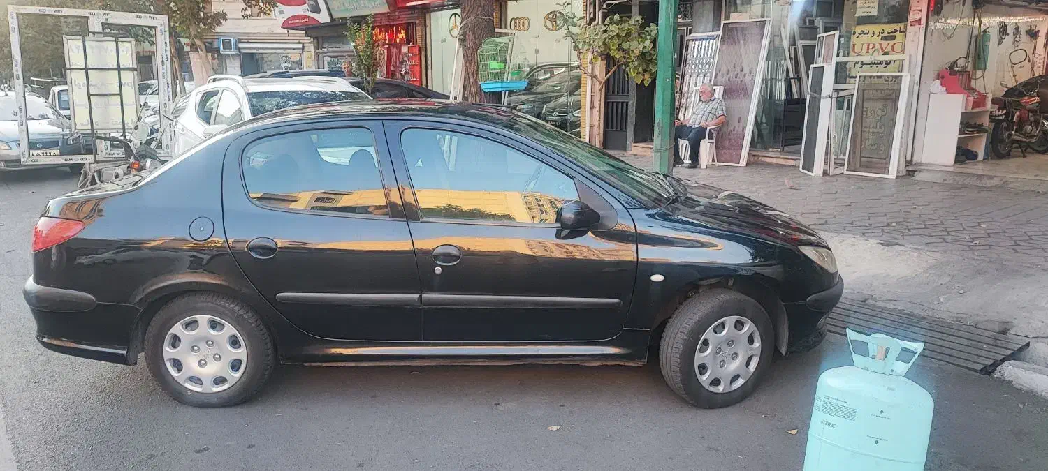 پژو ۲۰۶ صندوق دار v8 - 1396