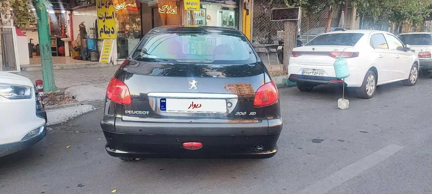 پژو ۲۰۶ صندوق دار v8 - 1396