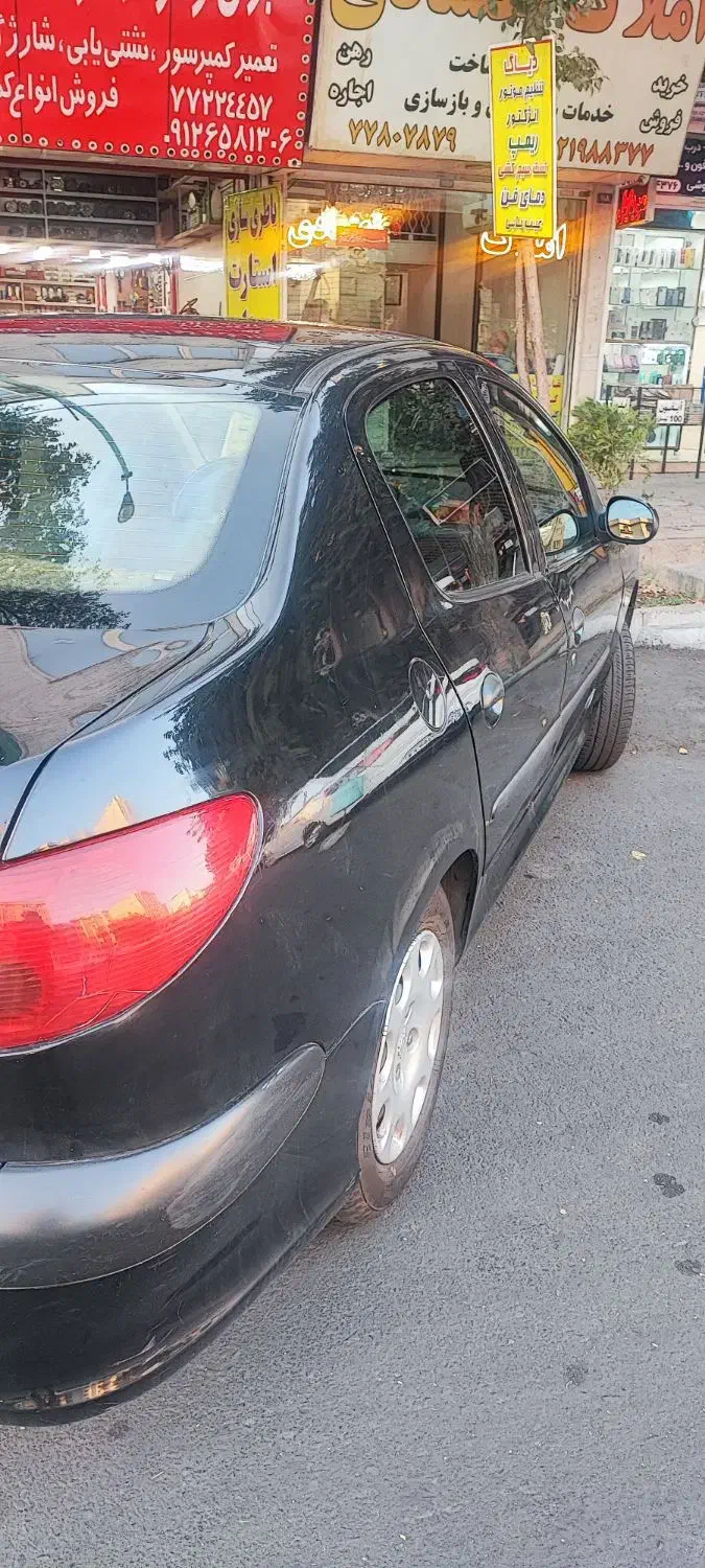 پژو ۲۰۶ صندوق دار v8 - 1396