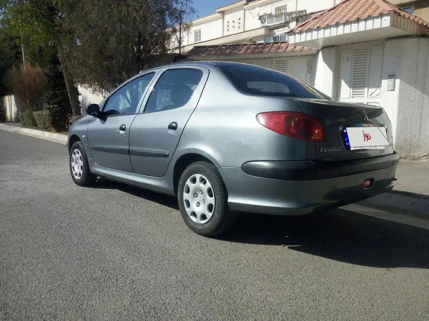 پژو ۲۰۶ صندوق دار v8 - 1396